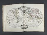 an open book with a map of the world on it