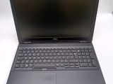 the dell laptop is open and ready to be used