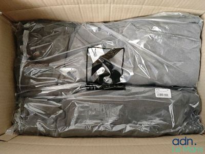 a box with a pair of scissors inside of it