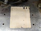 a piece of paper that is sitting on top of a machine