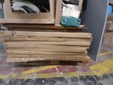 a stack of boxes and a microwave on a pallet