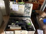 a box of tools sitting on a table in a room