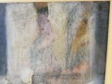 une image d'un tableau sur le mur d'une pièce