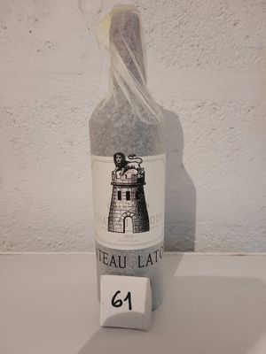 a bottle with a label on it sitting on a table