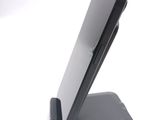 a close up of a cell phone on a stand