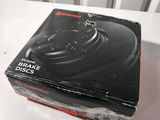 a close up of a box on a table with a camera in it