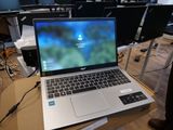 a laptop that is sitting on a table in a room