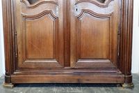 Bibliothèque en chêne mouluré et sculpté ouvrant à deux vant… (photo 2)