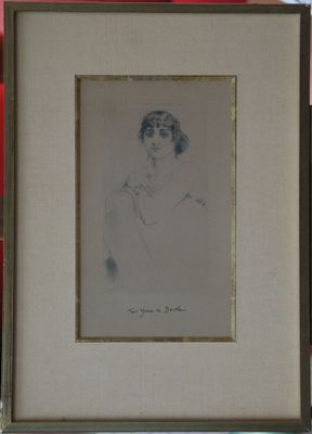 portrait of a woman in a hat by a red wall