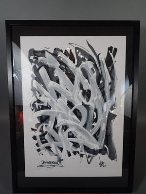 peinture représentant une photo en noir et blanc d'un graffiti sur un mur