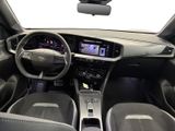 the interior of a car with a steering wheel, dashboard, and dash board