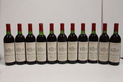six bottles of red wine lined up in a row on a table