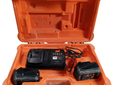 an orange tool case with two batteries and a charger in it