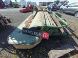 a picture of a tractor with a trailer attached to it ' s back