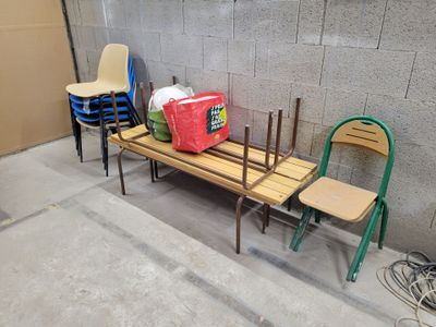 a bench that has a cooler on top of it