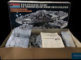 a box with a model of a space ship in it