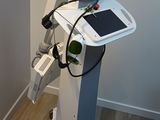 a machine that is sitting on a stand in a room