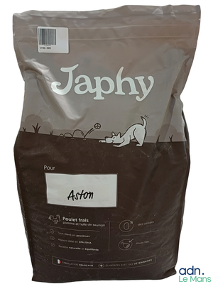 a bag of cat food that is sitting on a table