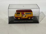 a toy van that is in a glass case