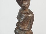 statue of a woman holding a baby in her arms