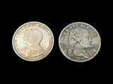 deux pièces d'argent, dont l'une représente le visage d'un homme et l'autre la tête d'une femme