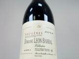 a bottle of wine that is sitting on a table
