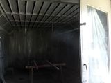 an image of a clean room with a door open