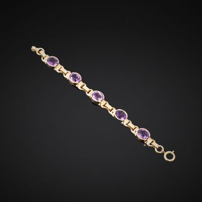 Bracelet en or jaune 750°°° orné de cinq améthystes taille o…