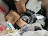 a cardboard box full of toilet paper and other items