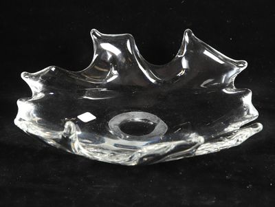 a clear glass bowl with a hole in the middle of it
