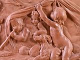 relief of a nativity scene in a black frame