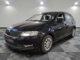 a picture of a black car parked in a showroom
