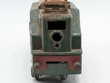 a toy train on a white surface with a white background