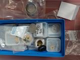 a plastic container with a lot of items inside of it