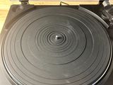 the record player is sitting on top of the turntable