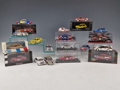 a lot of toy cars that are in a display case