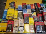 many different types of electronic equipment on the table
