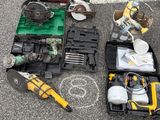 a lot of tools that are laying out on the ground