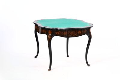 an image of a small table with a green glass top