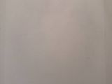 a picture of a white refrigerator freezer sitting in a kitchen