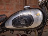 a close up of a motorcycle with a helmet on it