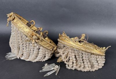 a pair of gold and crystal beaded purses with tassels