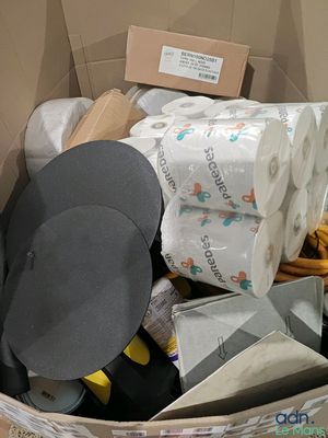 a box full of toilet paper, toilet paper, and other items