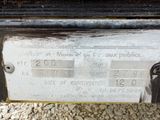 a close up of a sign on the back of a truck