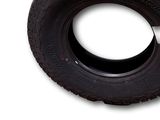 tire on a white background with a black rim and a white background