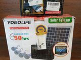 a box with a solar panel on top of it on a table
