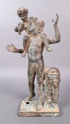 an image of a statue of a man holding a baby