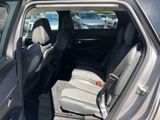 the back seats of a car are empty in the parking lot
