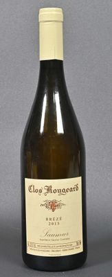 a bottle of wine that is sitting on a table