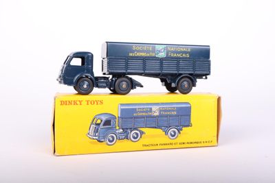 a toy truck that is sitting on top of a box